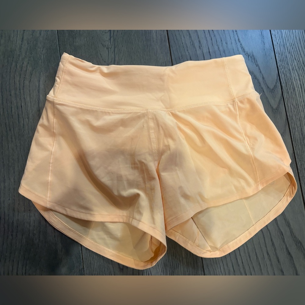 EUC Lululemon Athletica “Orange Summer Glow” Speed Up Shorts 4”